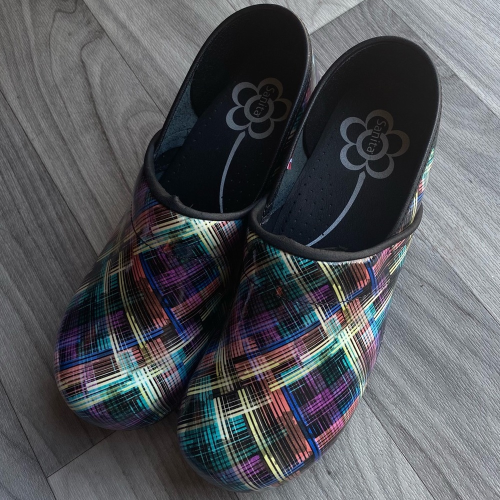 Sanita Multi color Clogs. They do have an big flaw